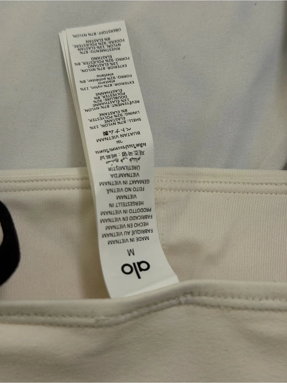 ALO Yoga Cream Crop Brami with Black Trim